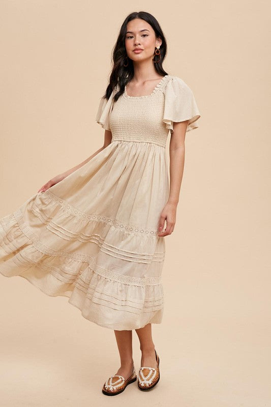 SMOCKED FLUTTER SLEEVE DRESS