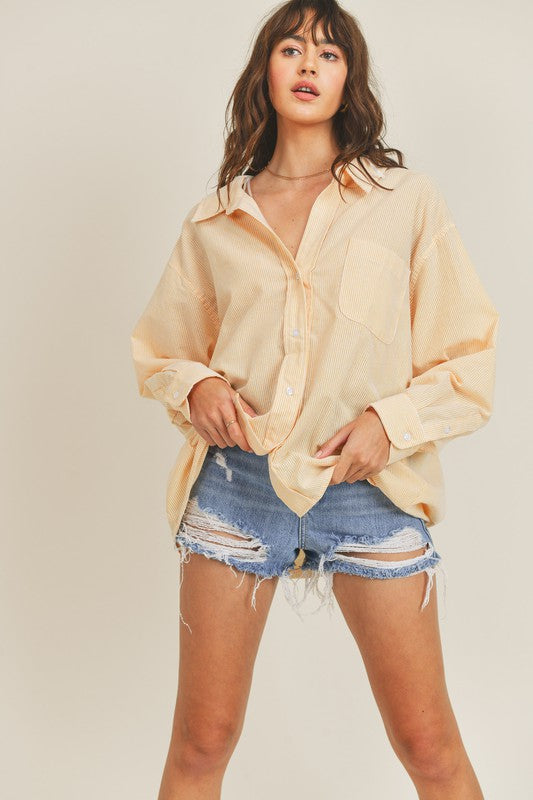OVERSIZED STRIPPED BUTTON DOWN SHIRT